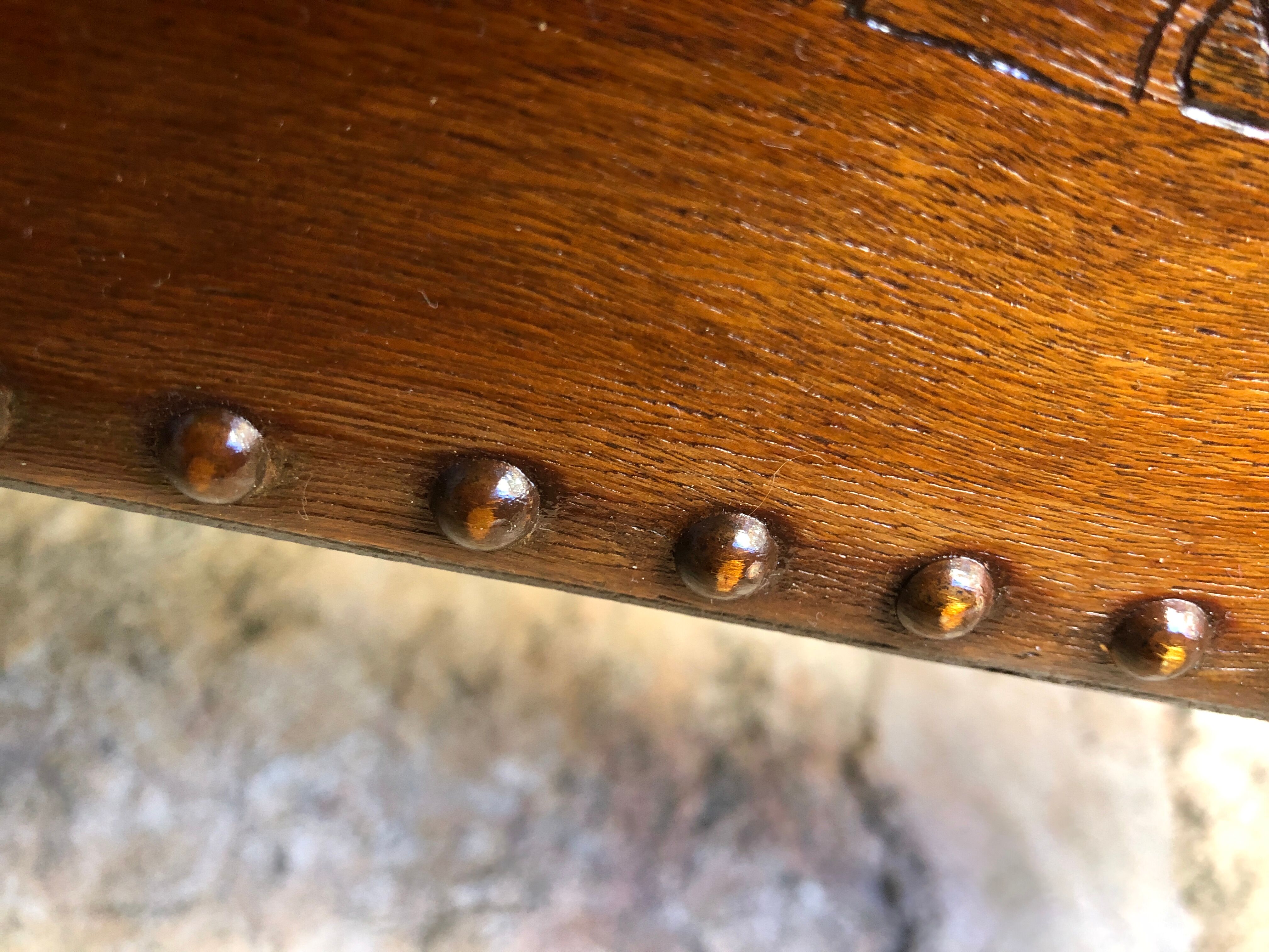Pair of studded nesting tables from the 1930s.