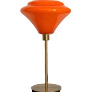 Table lamp with a vintage orange glass globe and a gold base