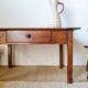 Old farmhouse coffee table in walnut with drawer - L82cm