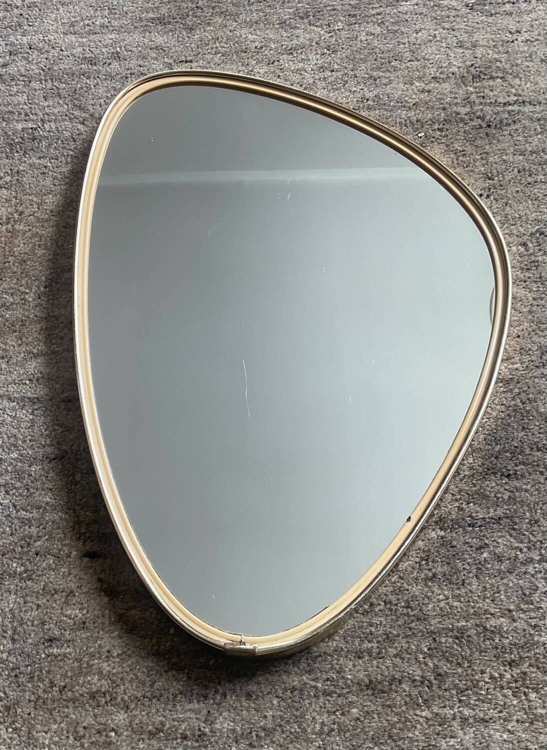 Asymmetrical free-form mirror from the 60s-70s.