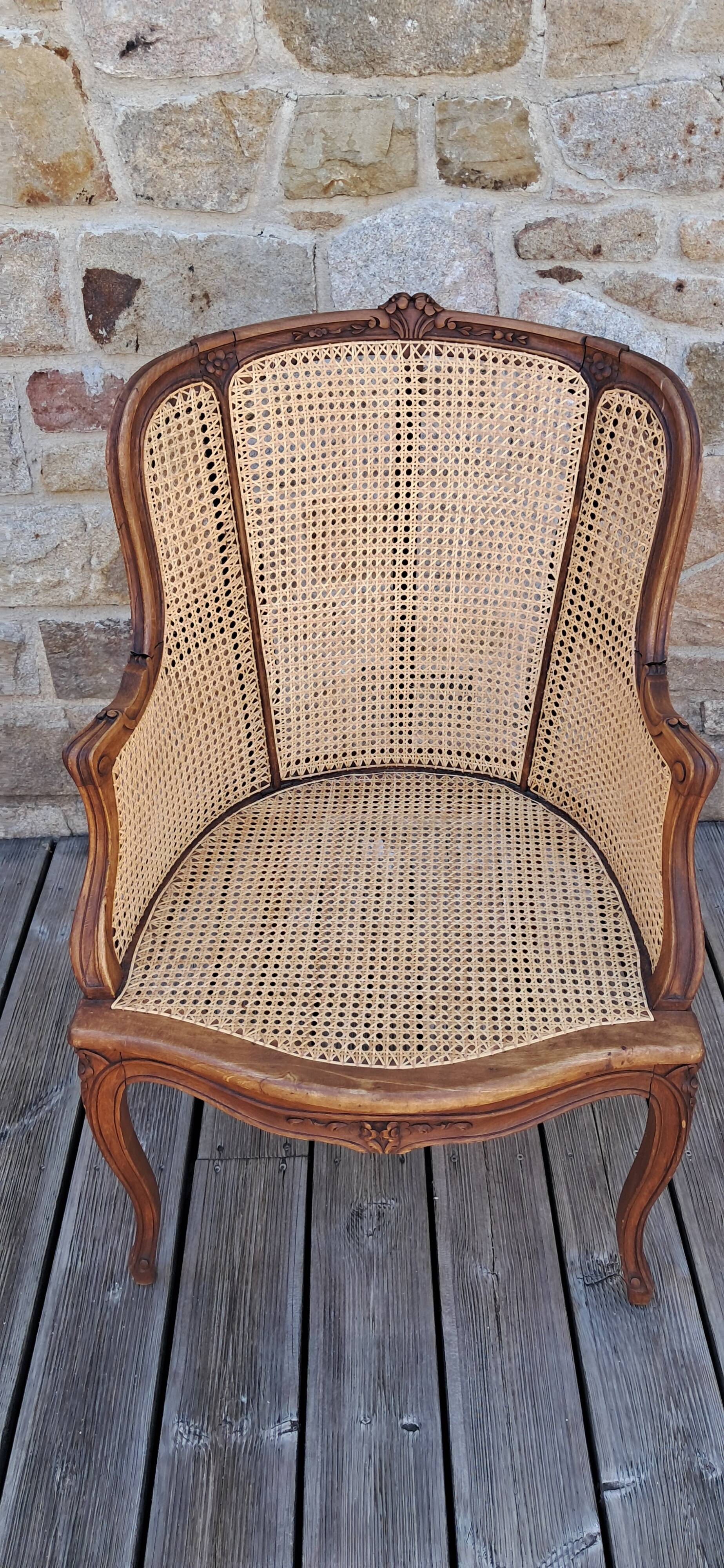 Caned armchair.
