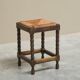 Solid oak stool, straw and brass from the 1920s.