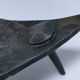 Brutalist metal pocket with patinated tripod