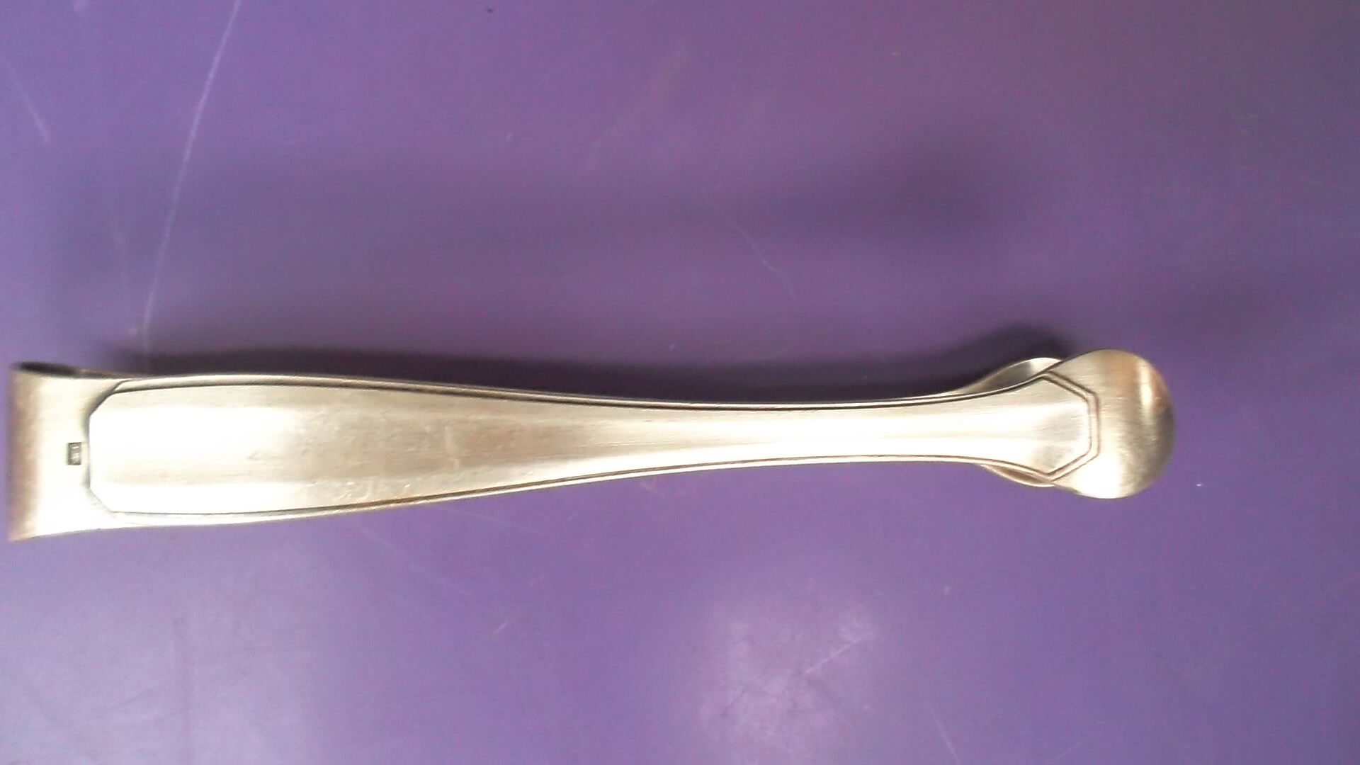 Silver metal sugar clip