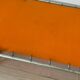 Orange and metal deckchair 1970