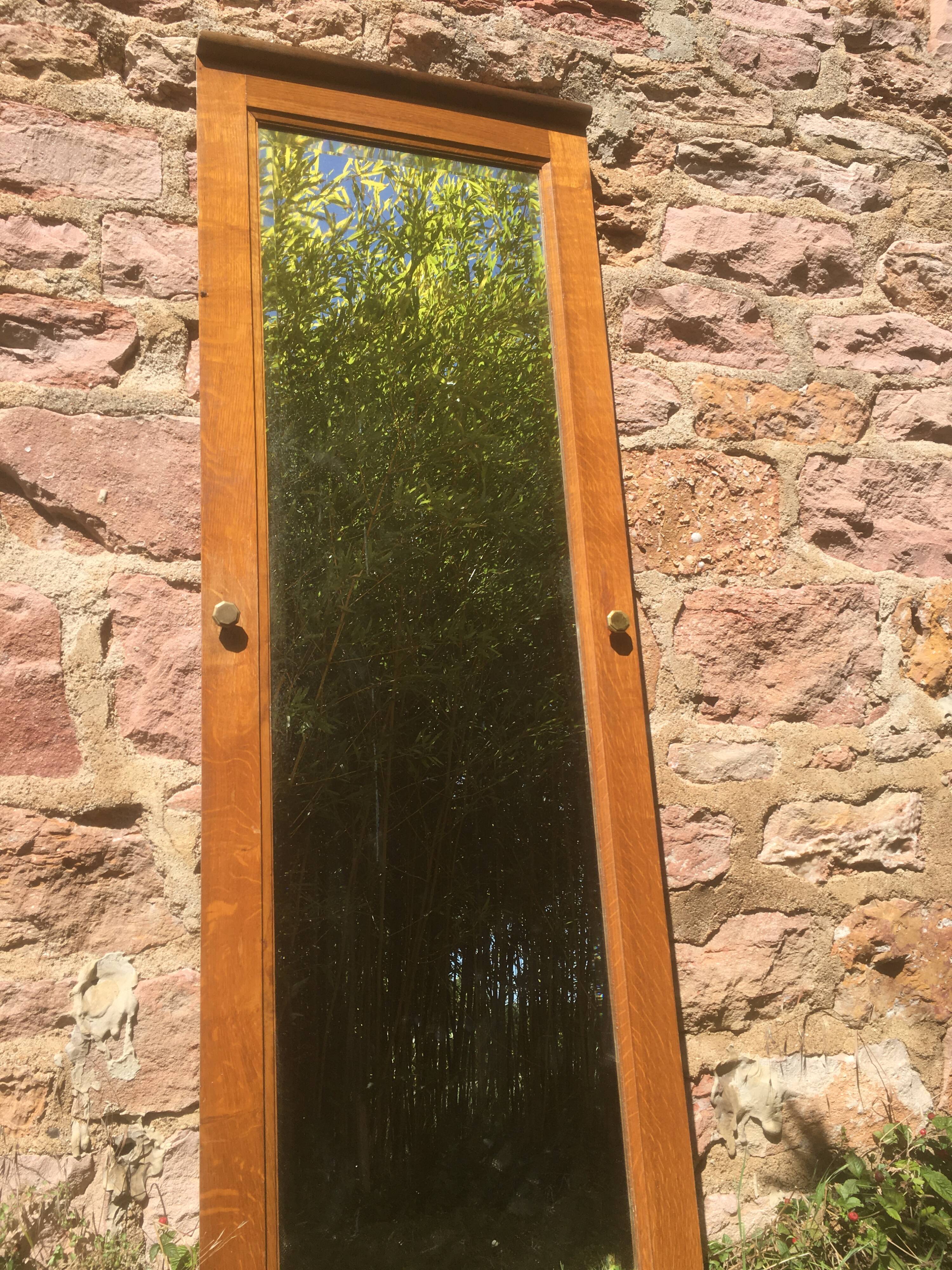 Bevelled mirror oak frame