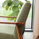 Vintage armchair in swamp green bouclé design by H. Lis.