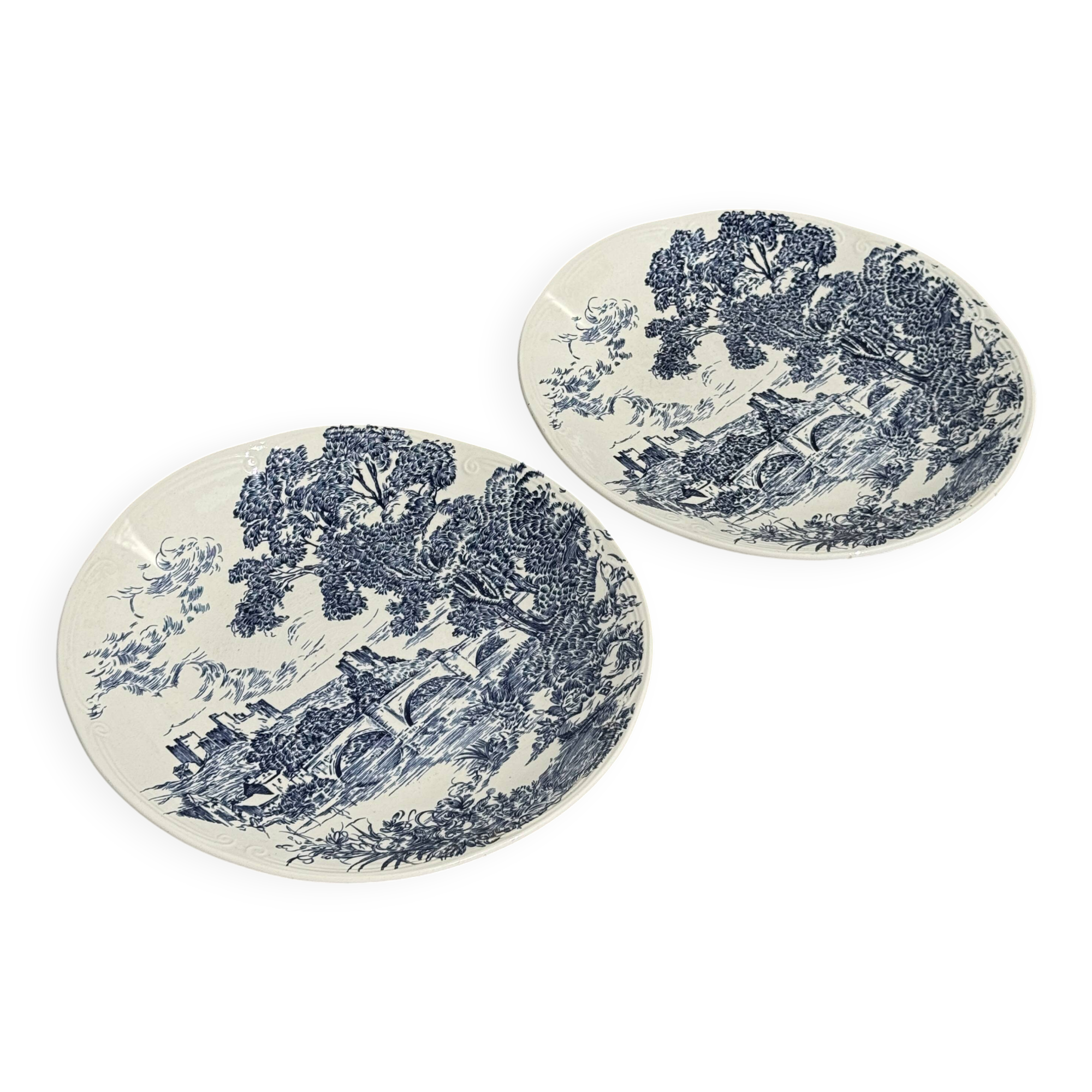 Set of 2 earthenware plates with blue decoration of a bridge and castle