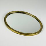 Vintage mirror in a brass frame, Italy, 1950s.