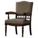 Modern Danish armchair in turned wood with floral fabric, early 20th century.