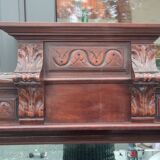 Old large carved wooden mirror