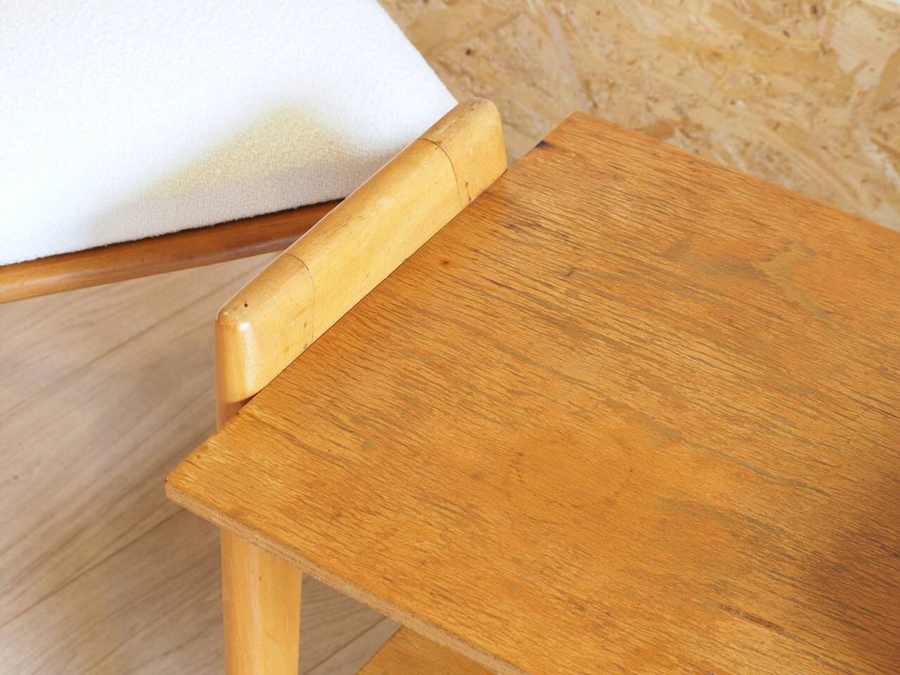 Bedside or side table with compass legs.