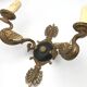 Antique bronze wall light with arm decorated with swans and palmettes in the Empire style
