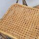 Pair of vintage metal and cane folding chairs