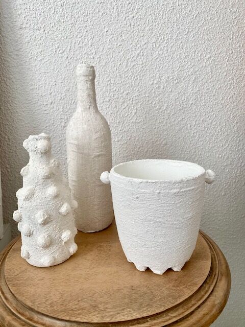 Trio of white vases