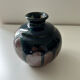 Ink blue round vase and bronze