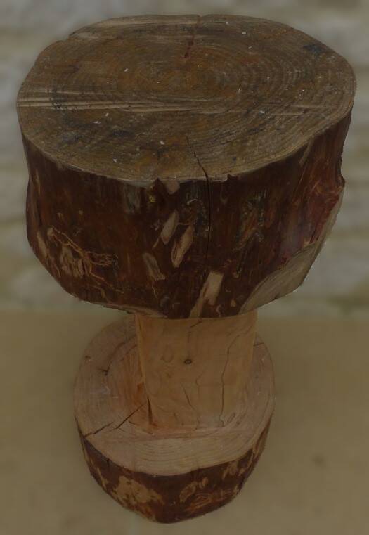 Large carved stool in solid oak