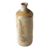 Leaf pattern stoneware bottle