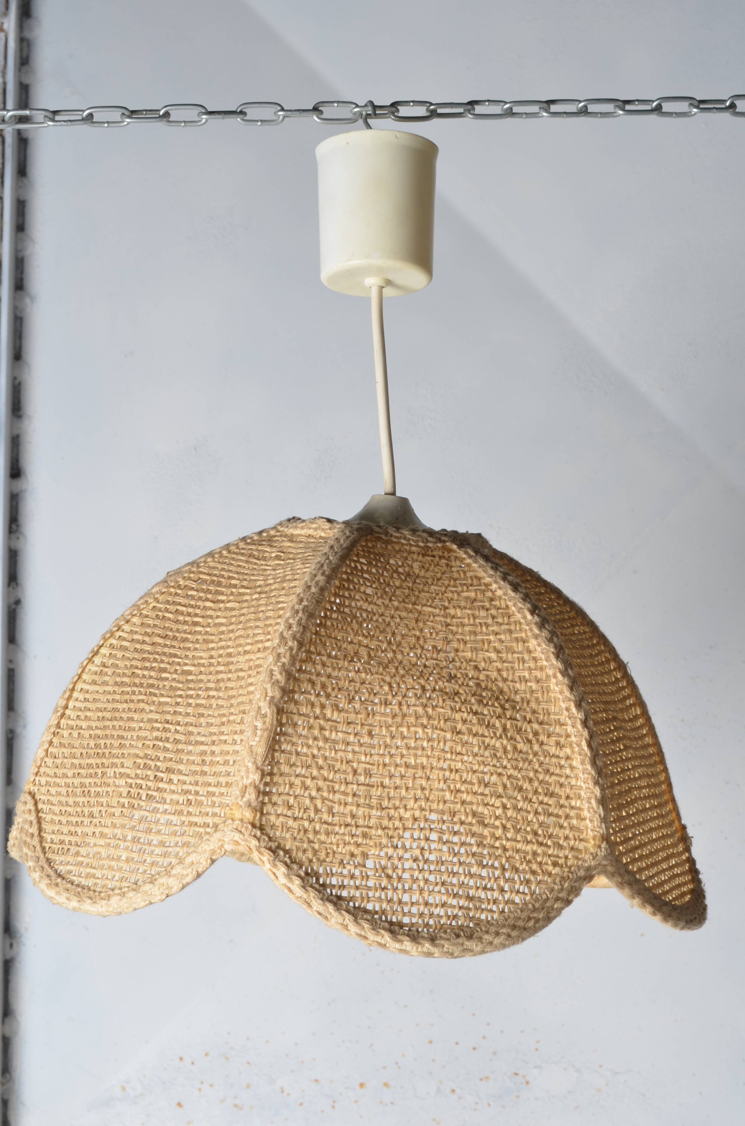 Braided flower pendant