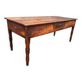 Antique farmhouse table in solid cherry wood with 3 drawers.