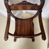 Gothic Curule Dagobert armchair in carved walnut, 19th century