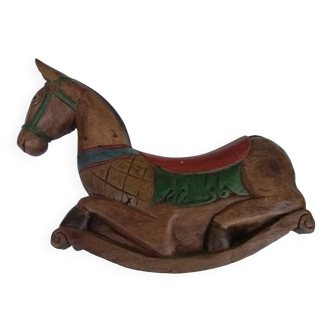 Carved wooden rocking horse