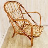 Pair of rattan chairs Audoux & Minnet 1960