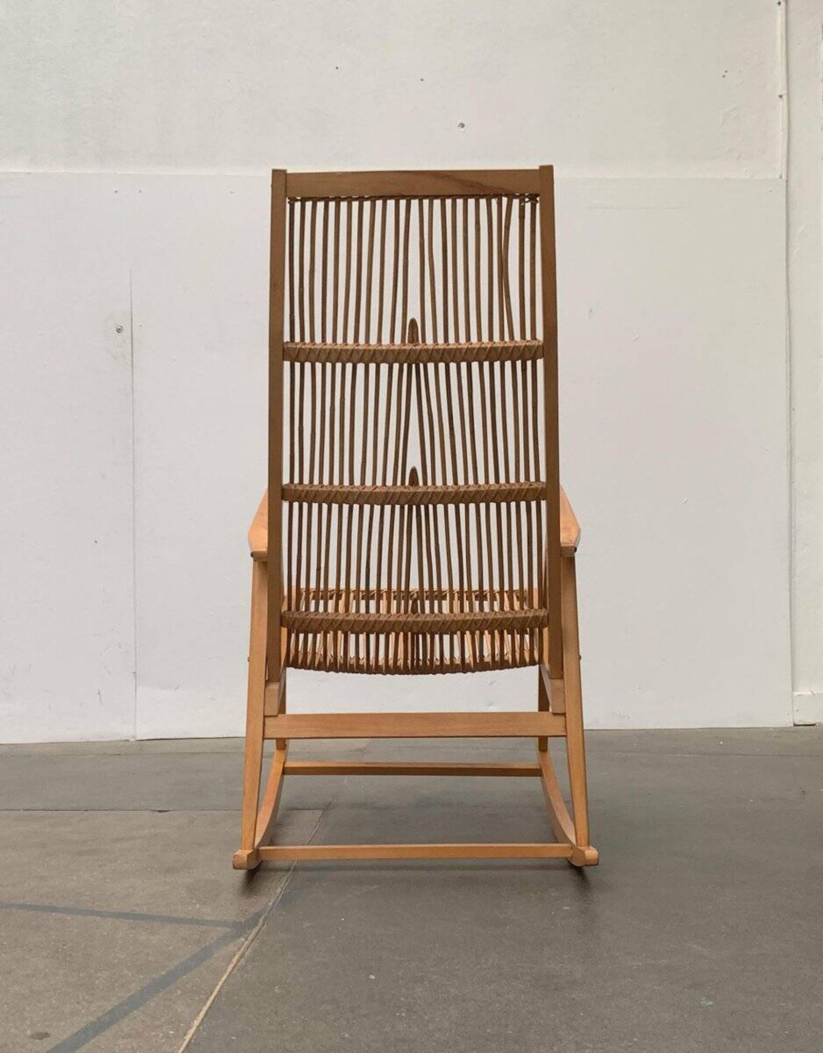 Mid-century German rattan rocking chair from Deutschen Werkstätten Hellerau, 1960s.