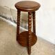 Sellette tripode en bois foncé