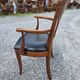 Mid-20th century solid cherry wood office chair.