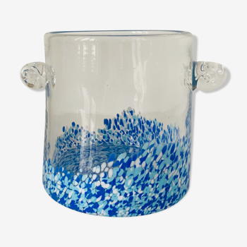 Cylindrical vase with handles in colorless glass splashed with blue and white in the lower part