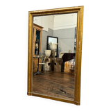 Old gilded fireplace mirror