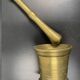 Large mortar & pestle. Chiseled bronze or brass metal, scarified decoration