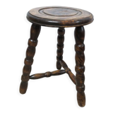 Tripod wooden stool turned