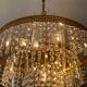 Old brass chandelier and crystal grapevines