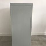 Three-drawer industrial grey metal filing cabinet with hanging backs