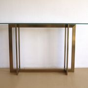 Modernist brass and glass console table & mirror. 1970s
