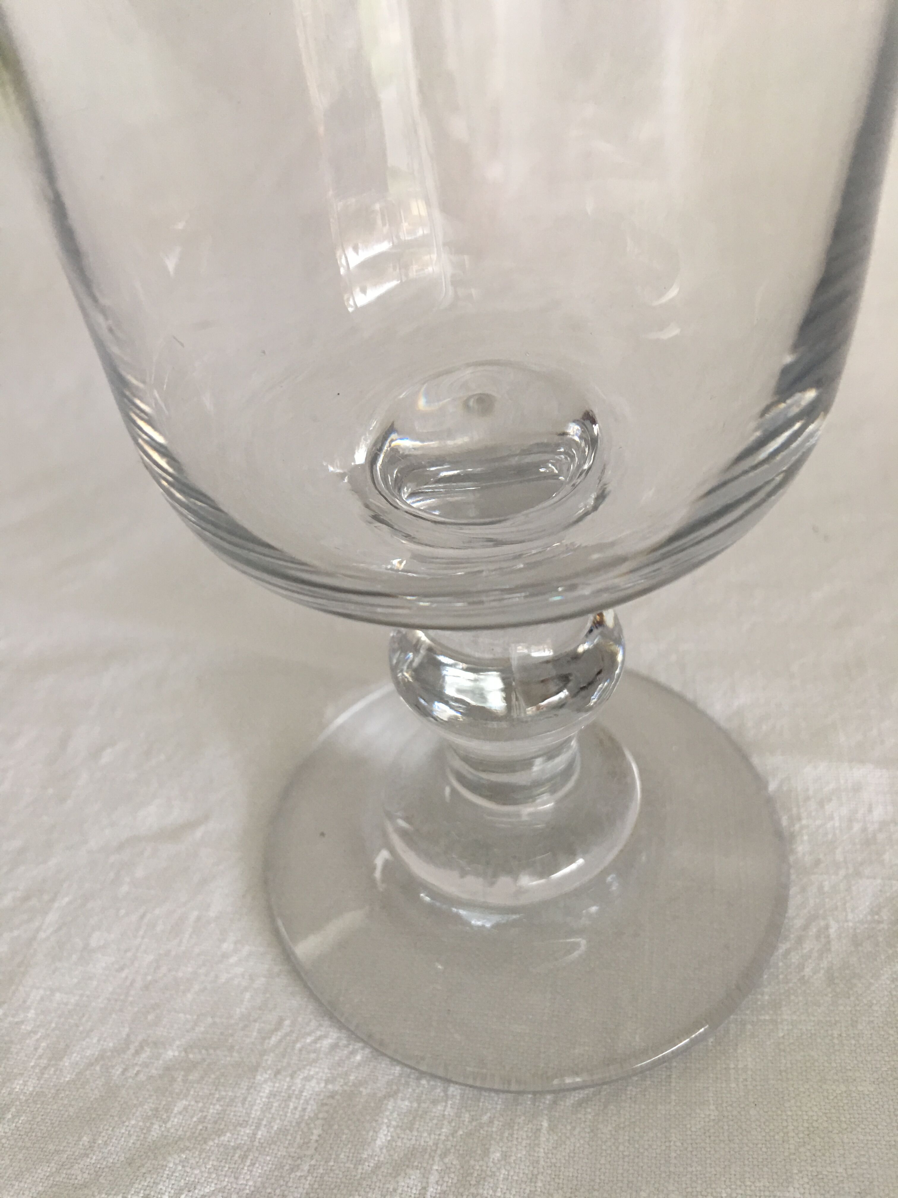 Glass on foot - blown glass bubble late nineteenth early twentieth