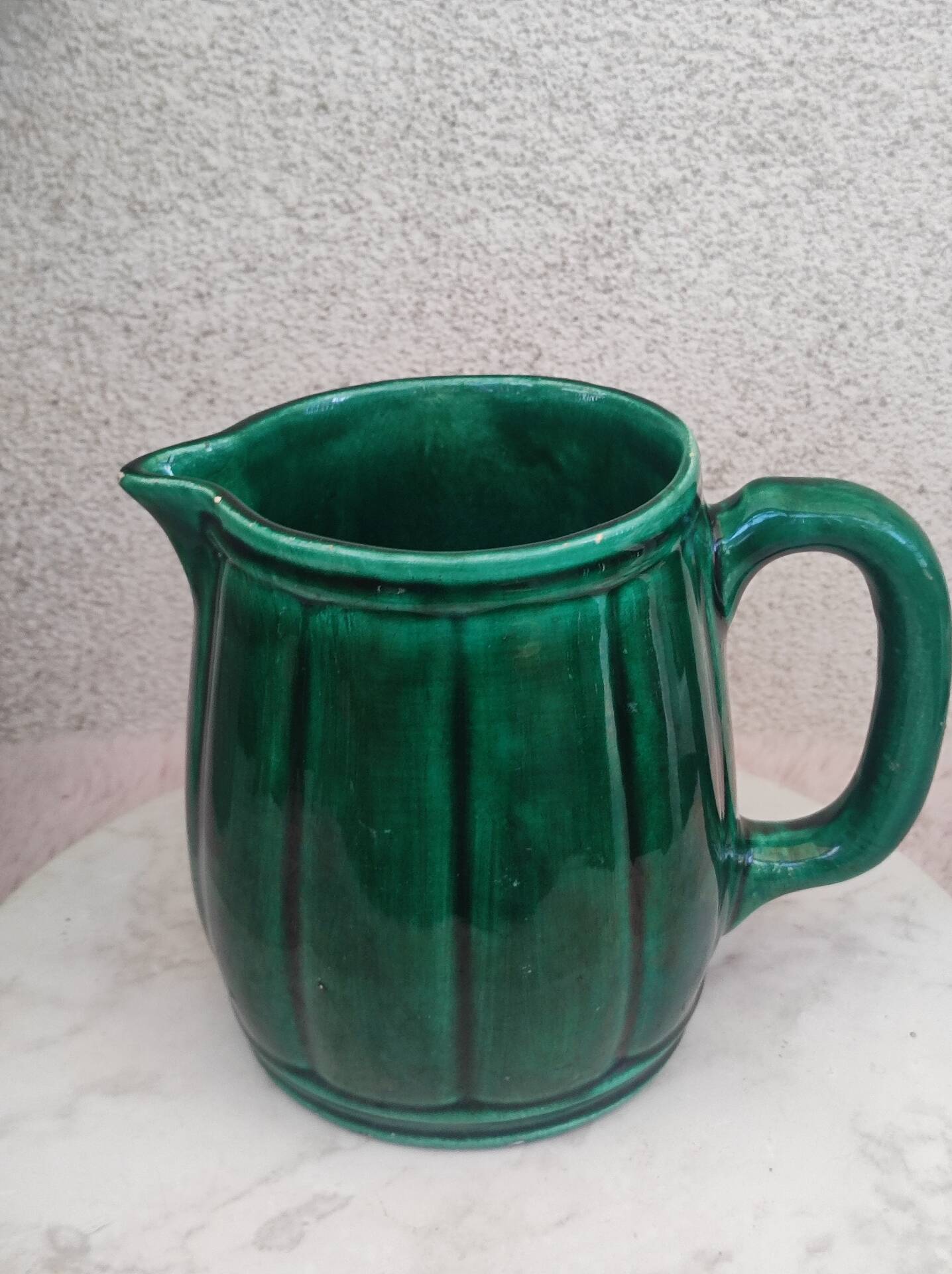 Old green jug