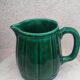 Old green jug