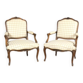 Pair of Louis XV style armchairs in molded and carved beech