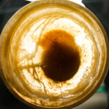 Set of 4 marble and brass espresso cups and saucers