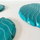 Ceramic trivet and bottle coaster from the 1950s.