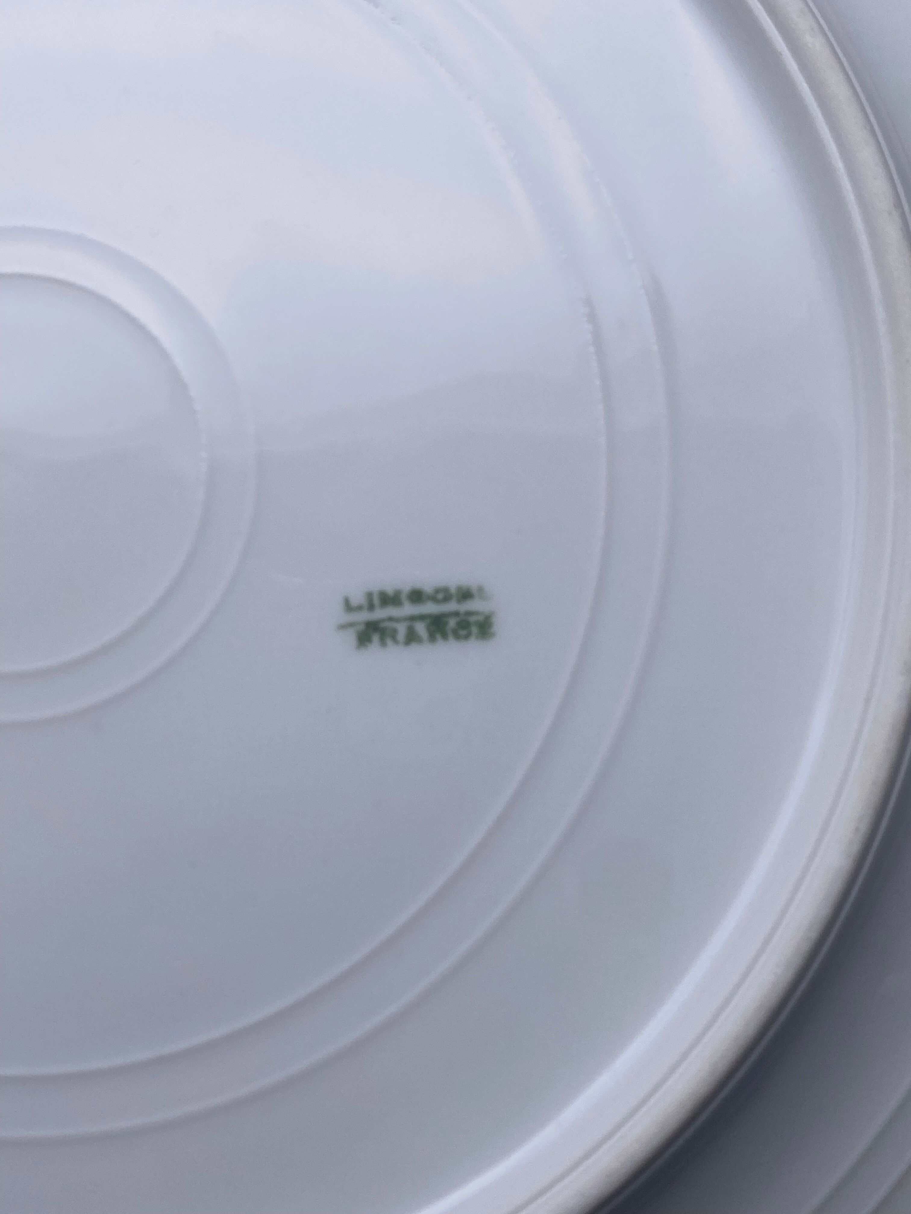 Limoges porcelain flat plates and gilding