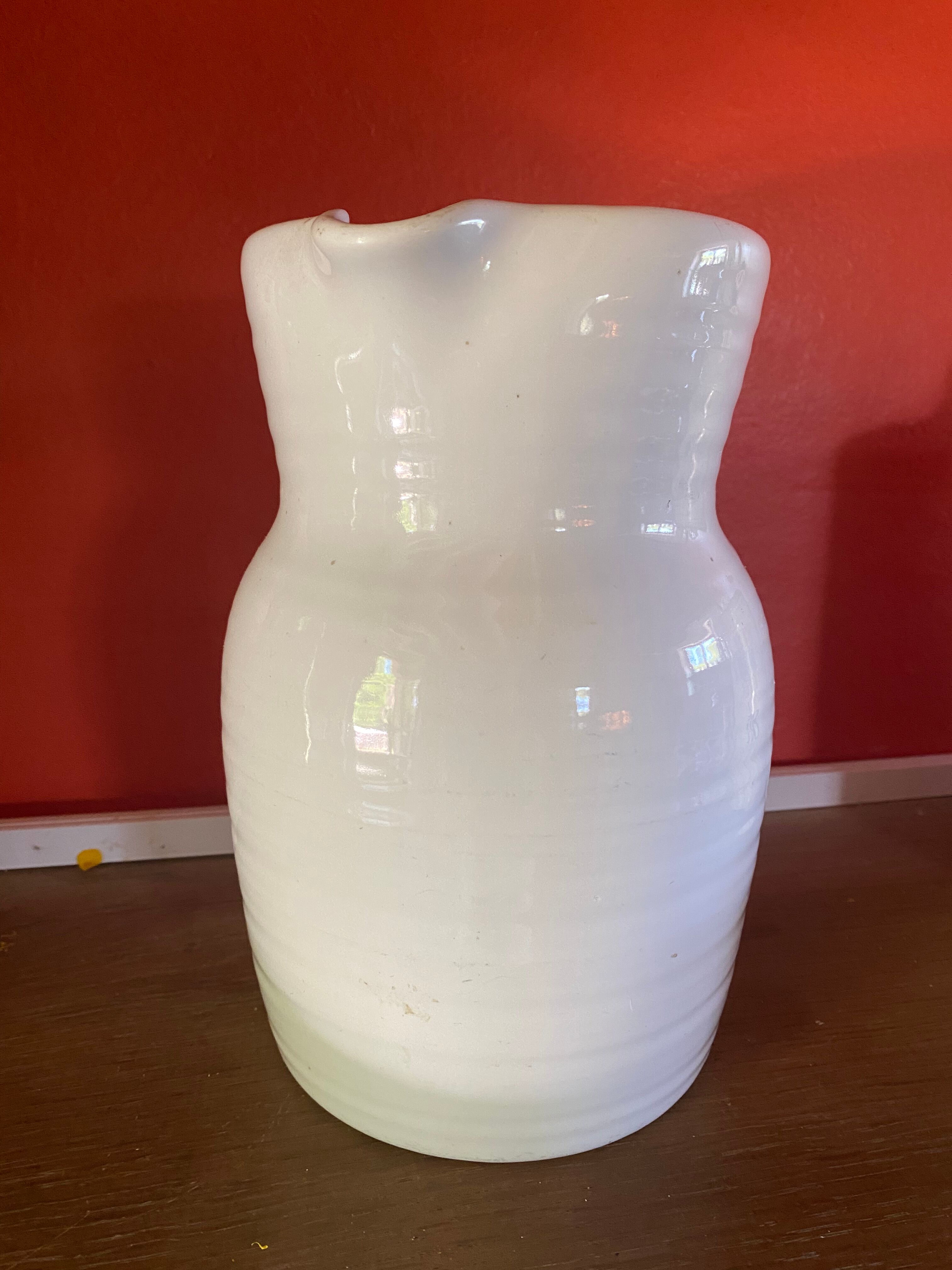 Large white ceramic pitcher