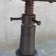 Height-adjustable leather stool with cast iron base