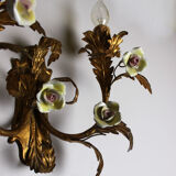 Pair of golden wall sconces and porcelain flowers