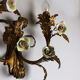 Pair of gold wall sconces with porcelain flowers