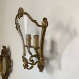 Wall lamp in Louis XV style in brass, shell decoration.