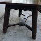 Very beautiful solid wood coffee table with pretty sculpture